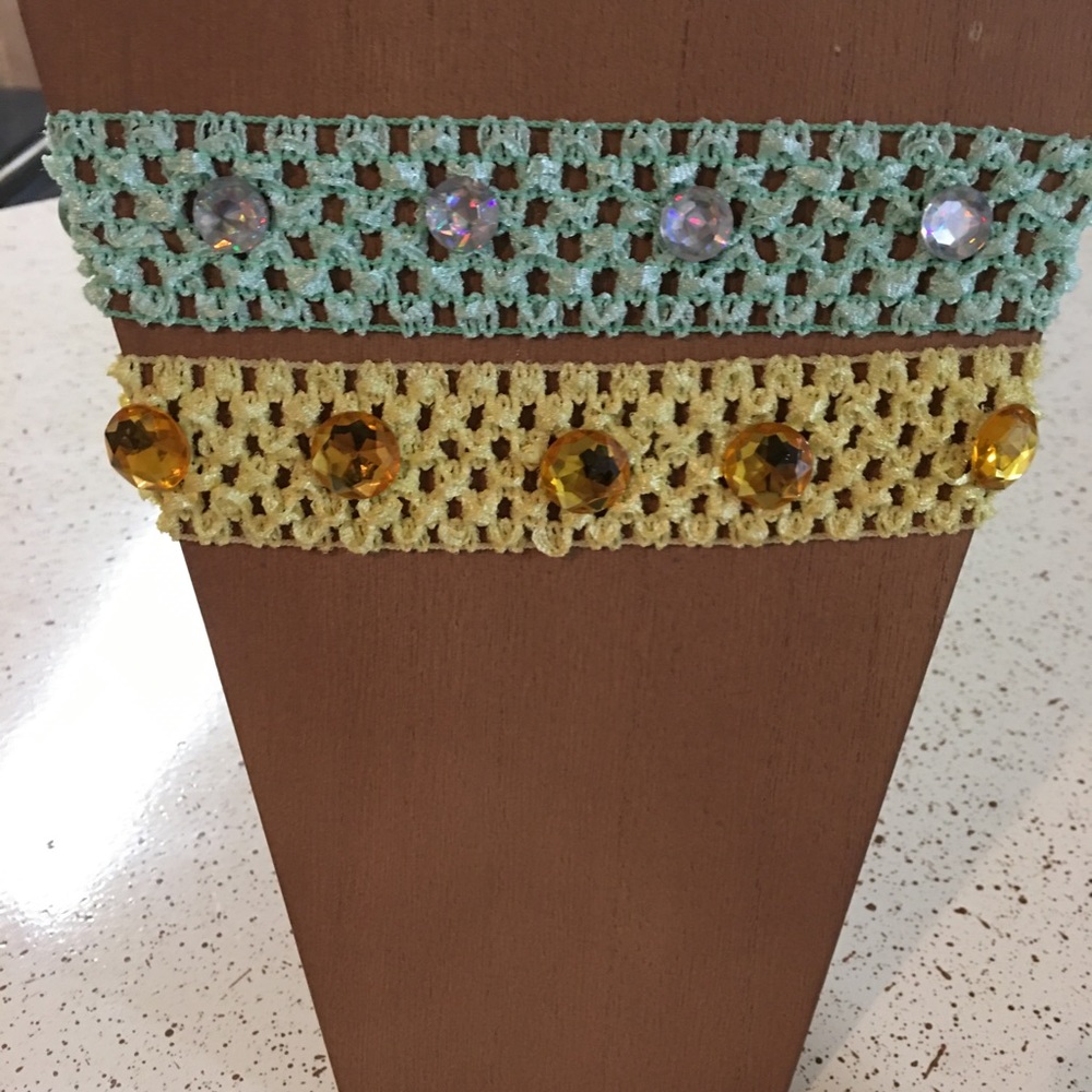 Embellished misses head bands.